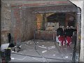 budoucí prostory podzemního sálu Společenského centra sboru - pohled na jeviště a místnost kotelny 