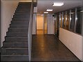 chodba před čelním vstupem do sálu sboru, dětskou místností a schodištěm na balkon sboru 24.6.2009 